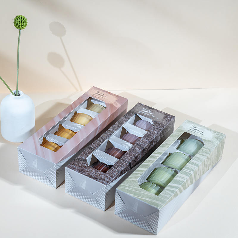 Set med 4 vertikala randiga små ljuskoppar av dvärgglas